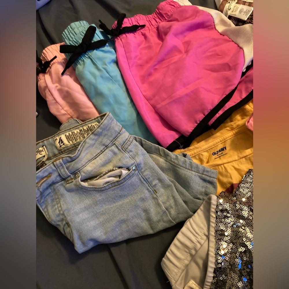 Kids size 14/L gently worn name brand tops and bottoms. 16 pieces
